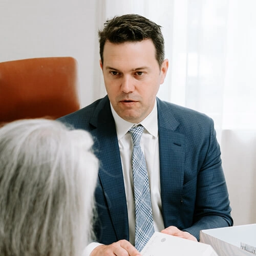 Dr Drew Cronin in consultation at The Coastal Clinic, Southport